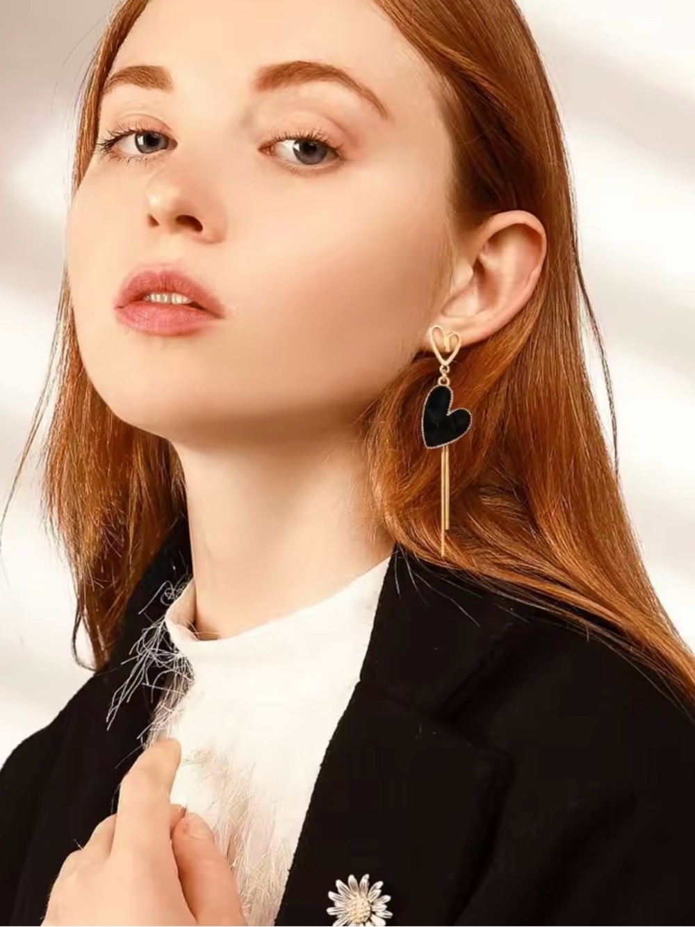 Gold Heart Drop Earrings with Black Speckled Inlay